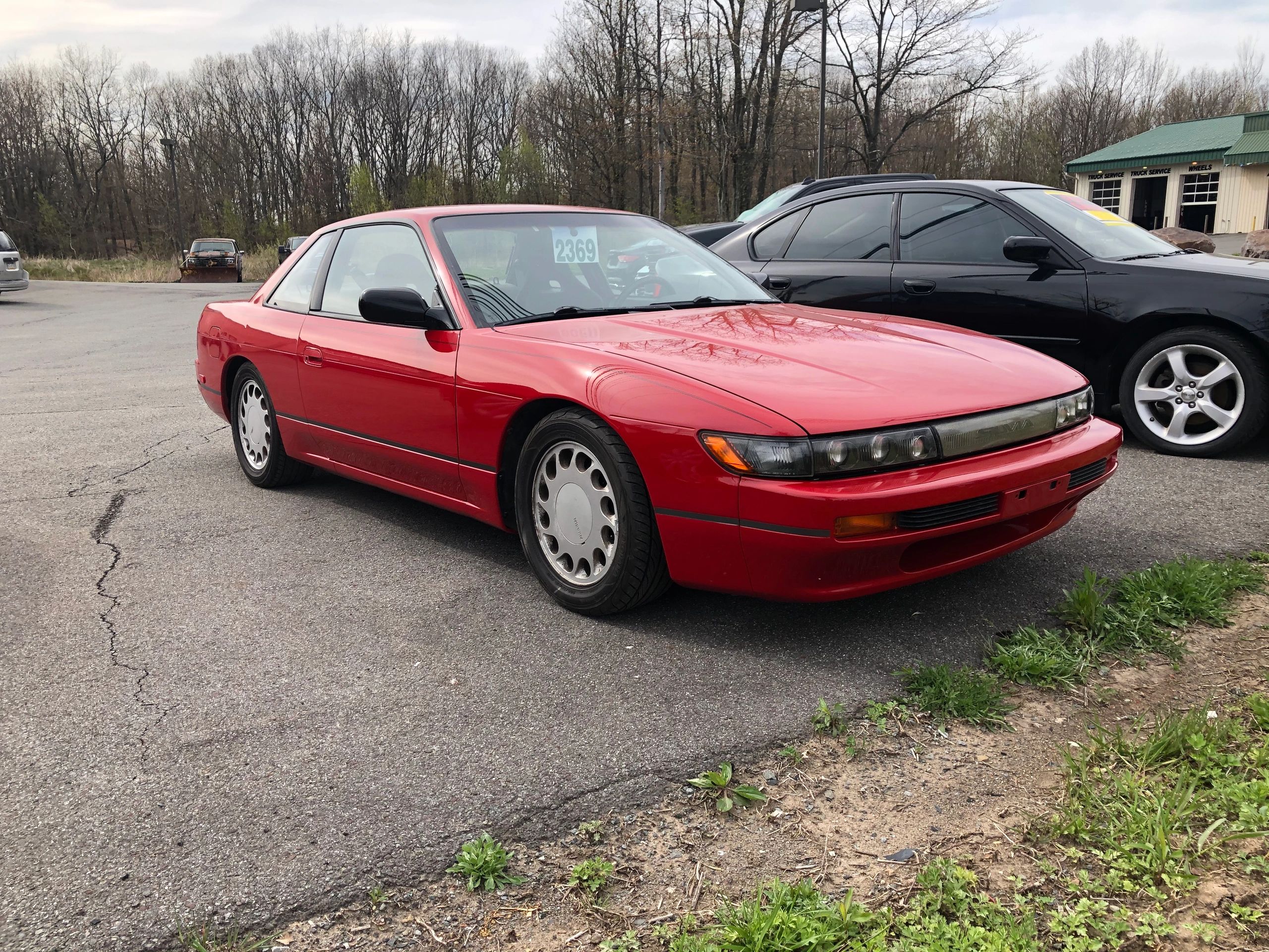 Technician performing precision auto body repair